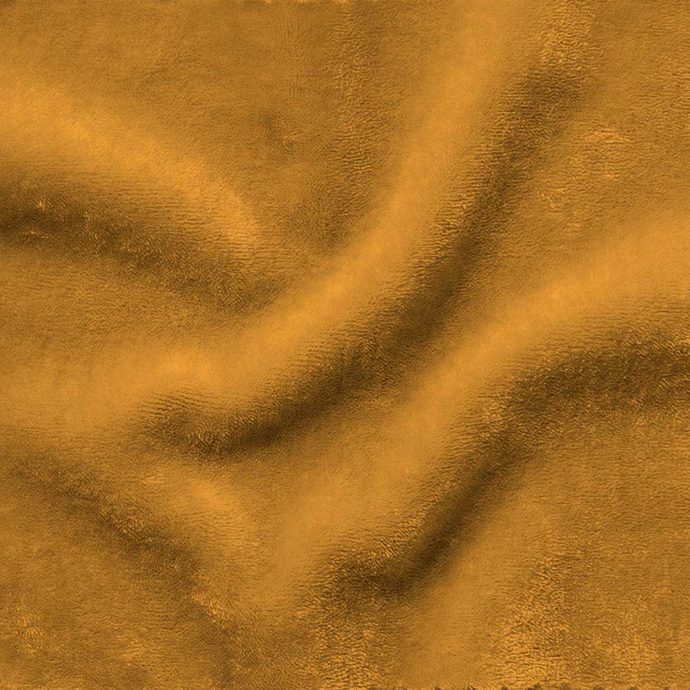 Close-up of Mohair Velvet in Antique Gold, showing the characteristic silky luster and dense pile of natural mohair fibers in a rich, saturated mustard-yellow hue.