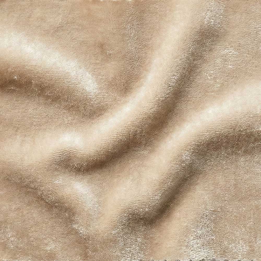 Close-up swatch of Mohair Velvet in Champagne Oyster, showing a dense, lustrous pile in a pale, creamy beige hue with a natural silky sheen that reflects light.