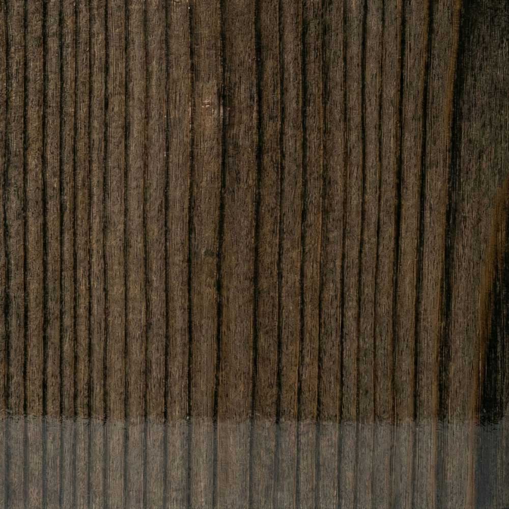 A detailed close-up of a Polished Grey Ash surface, showing a glossy, cool-grey finish that coats the wood while leaving the deep, natural grain ridges visible and unfilled.