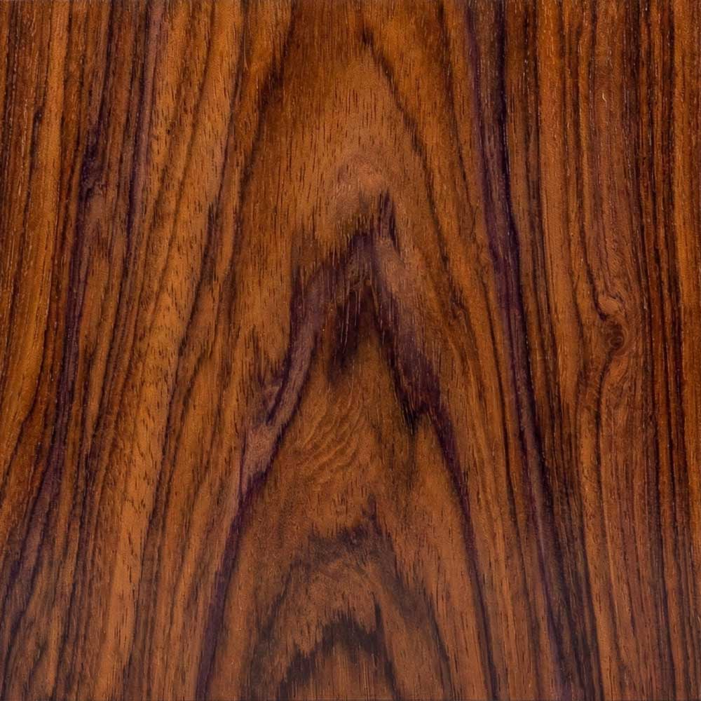 A close-up view of a polished Santos Palisander surface, displaying a warm spectrum of reddish-browns and oranges intersected by distinct, dark brown grain lines.