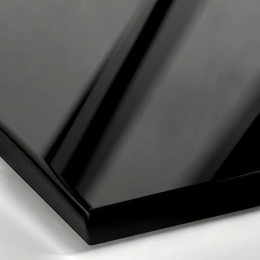 A close-up of a Polished Black Lacquer surface, featuring an opaque, jet-black finish with a flawless, high-gloss mirror reflection.